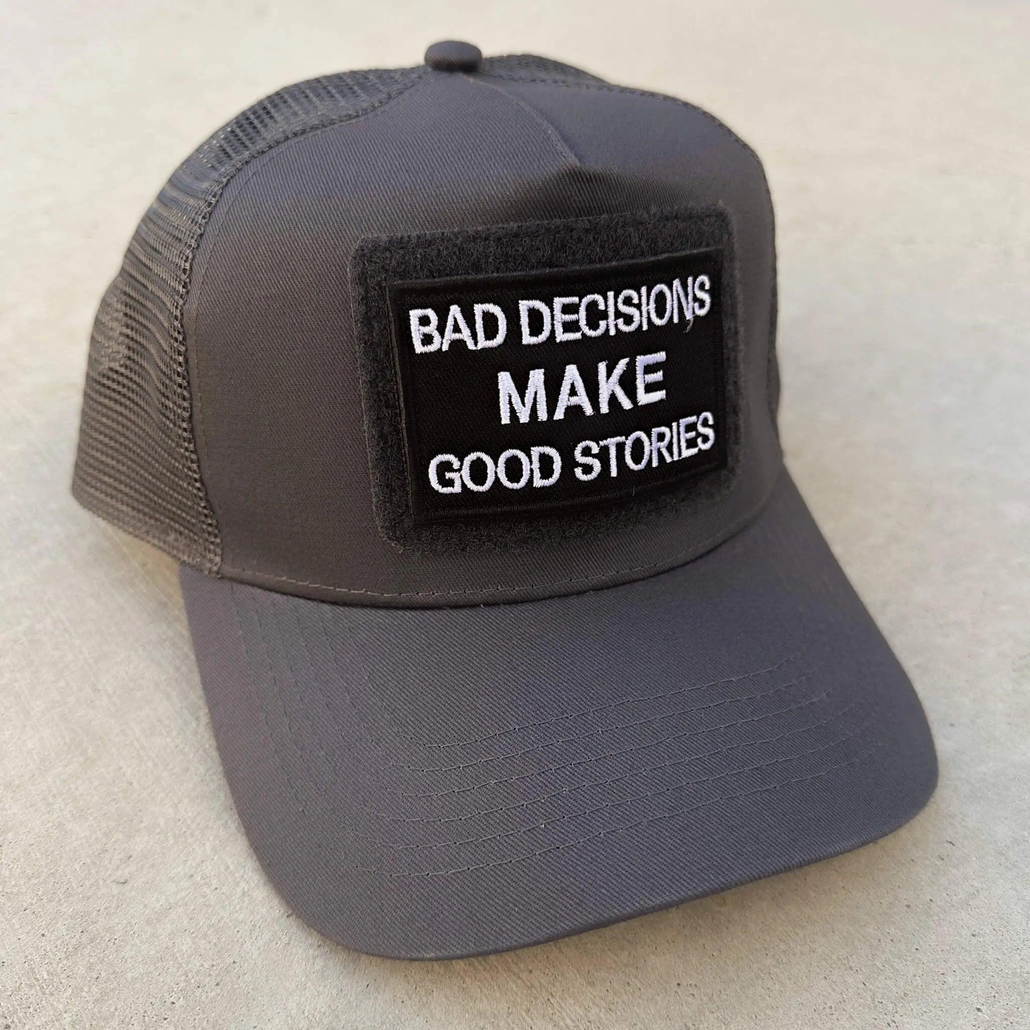 Trucker snapback cap in grey with Bad Decision Makes Good Stories patch