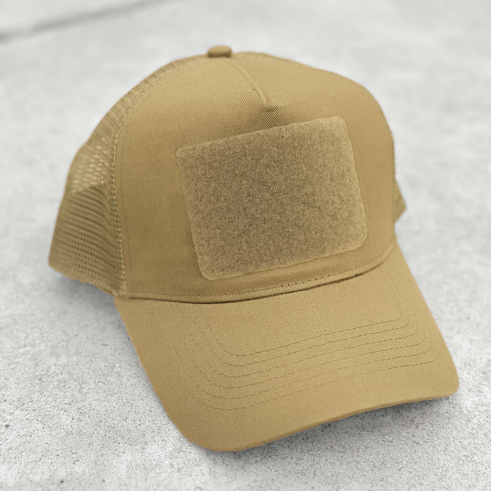 The Blank Canvas Snapback Cap in desert sand color with large hook-and-loop area on the front