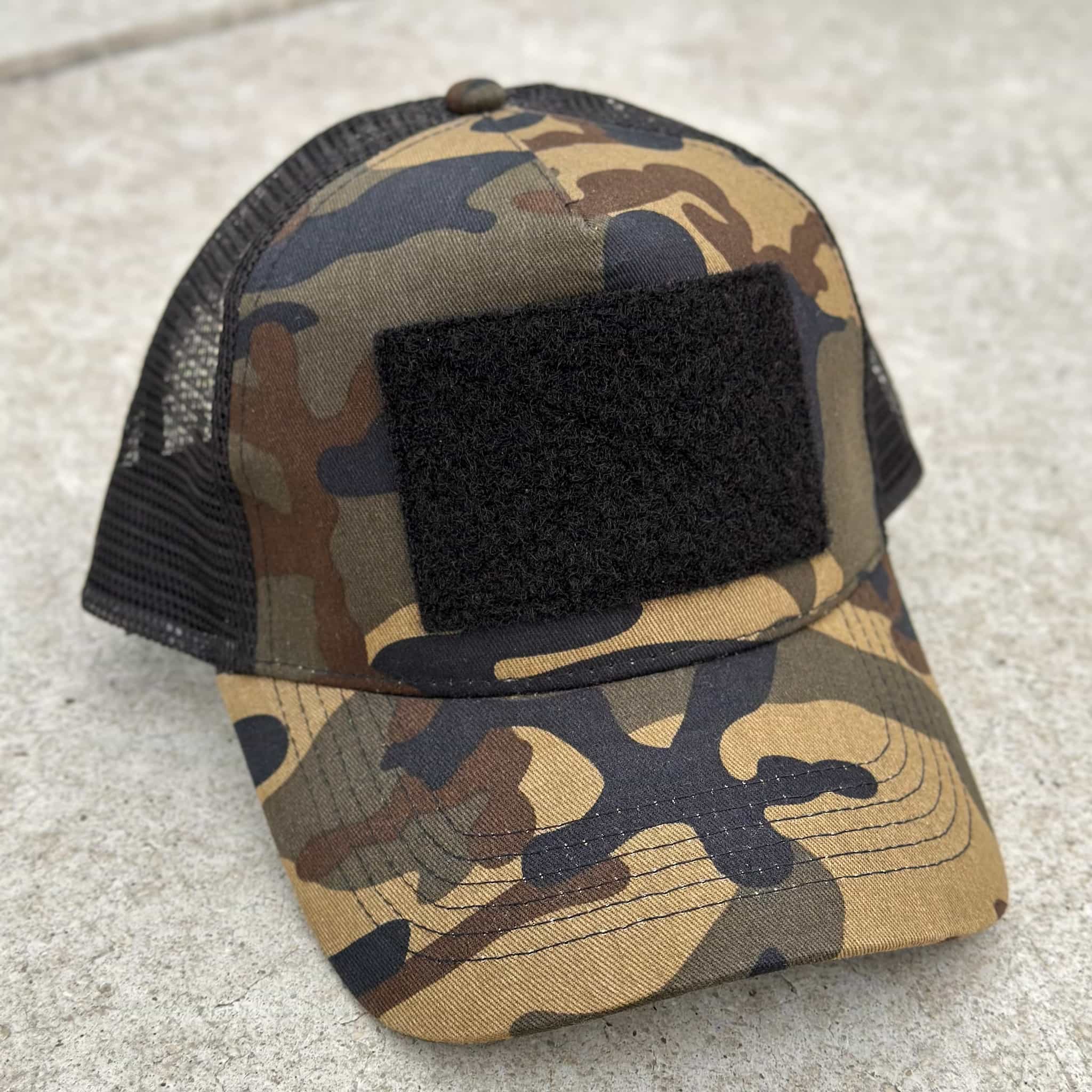 The Blank Canvas Snapback Cap in camo color with large hook-and-loop area on the front