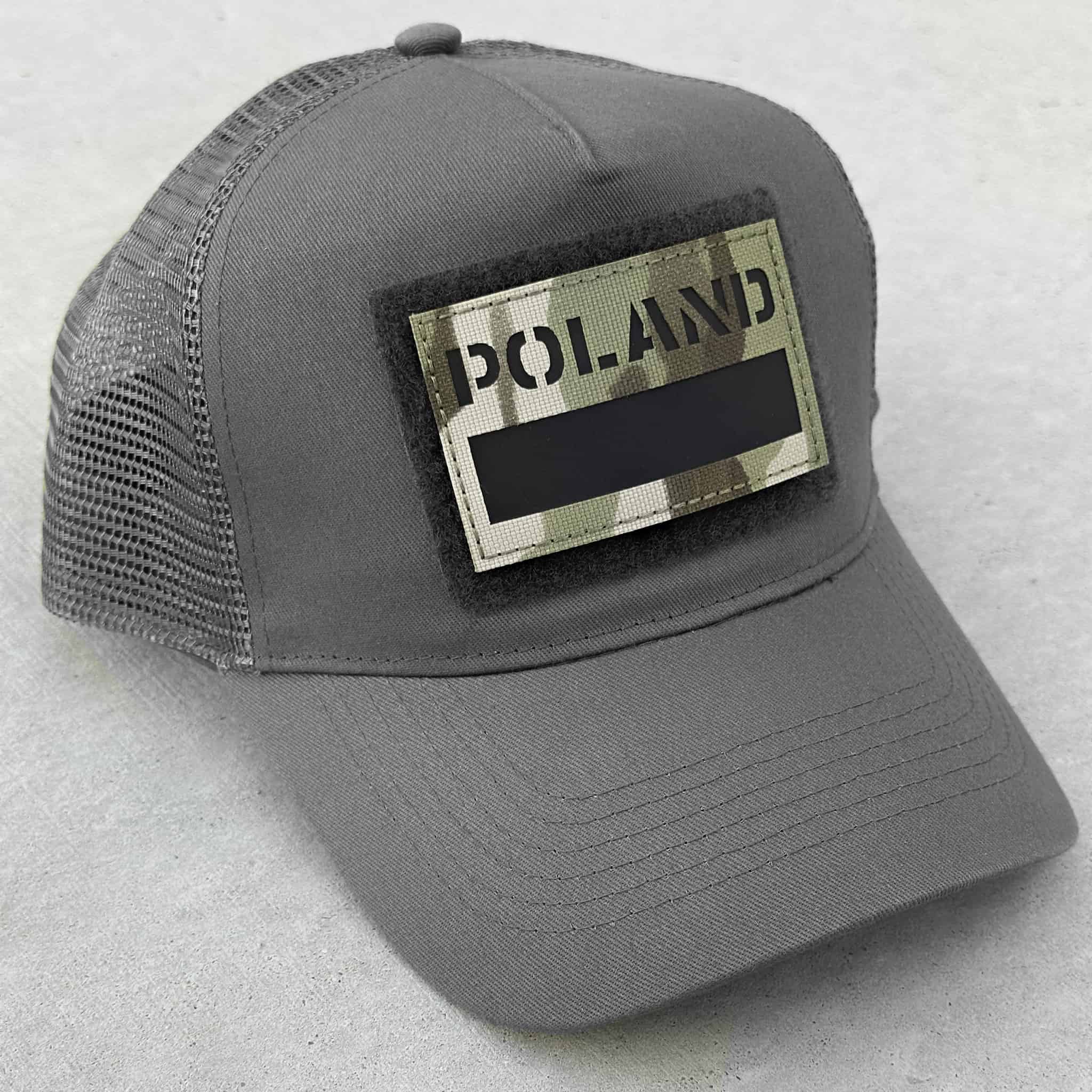 The trucker snapback cap in grey with Poland flag patch attached